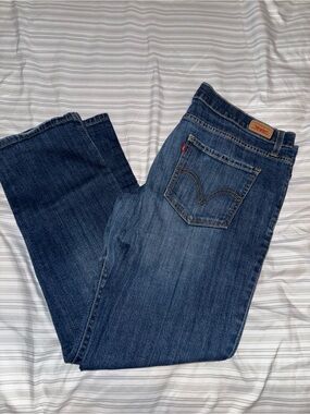 Vintage Levi's Medium Blue Denim Boyfriend Jeans with Gold Stitching